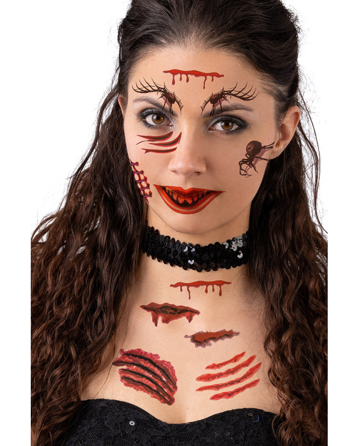 Spiders and wounds tattoos in polybag on card