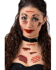 Spiders and wounds tattoos in polybag on card