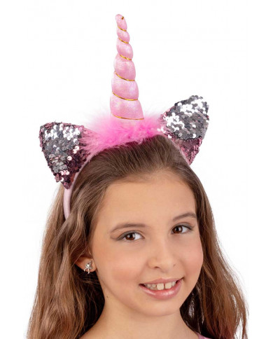 Pink unicorn headband with two ears decorated with reversible