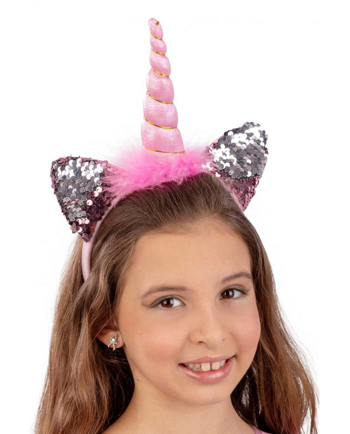 Pink unicorn headband with two ears decorated with reversible