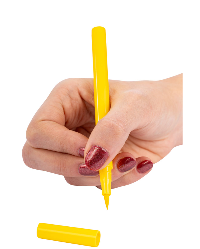 Gelber Schminkstift Gesicht/Körper auf Pappkarton