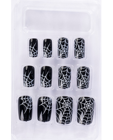 Faux ongles adhésifs noirs avec toiles d’araignée dans une boîte