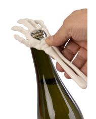 Skeleton hand bottle opener in bag on card
