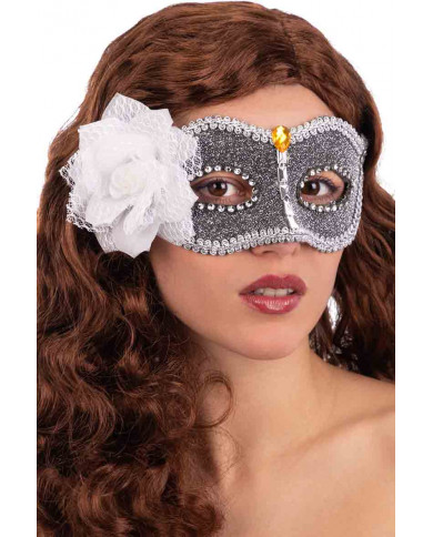 Half face silver mask decorated with trimmings and silver gems