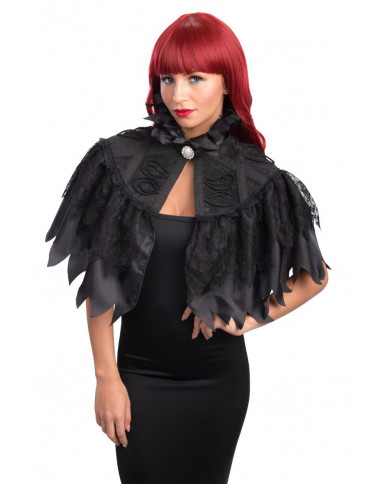 Black cape in taffetas, lace and velvet. With white cameo in