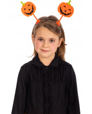 Headband with orange antennas with two smiling pumpkins in felt