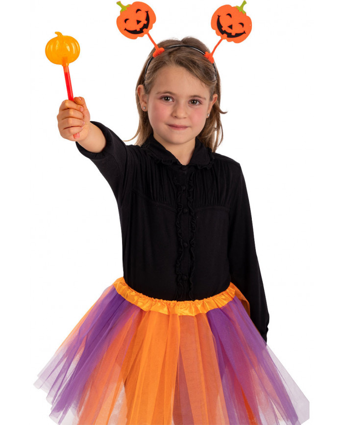 Orange wand with pumpkin in plastic which glows in the dark
