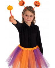 Orange wand with pumpkin in plastic which glows in the dark