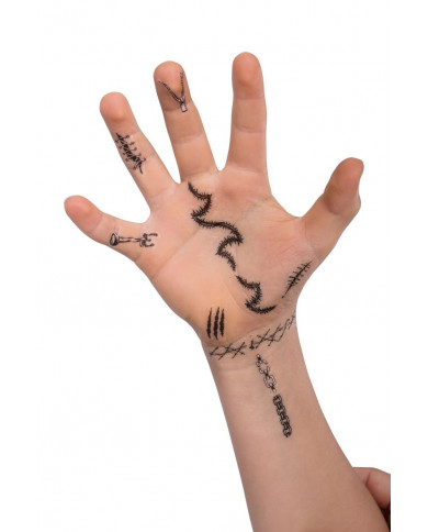 6 black and white adhesive tattoos depicting assorted Halloween