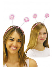 Cerchietto rosa con antenne con stelle rosa.