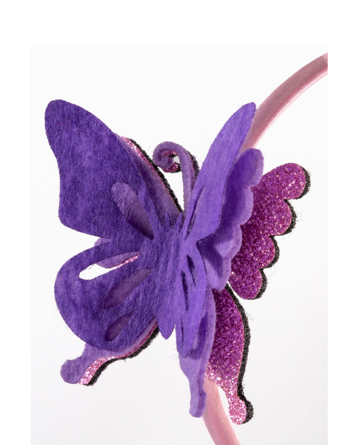 Diadema de mariposa lila c/cav.